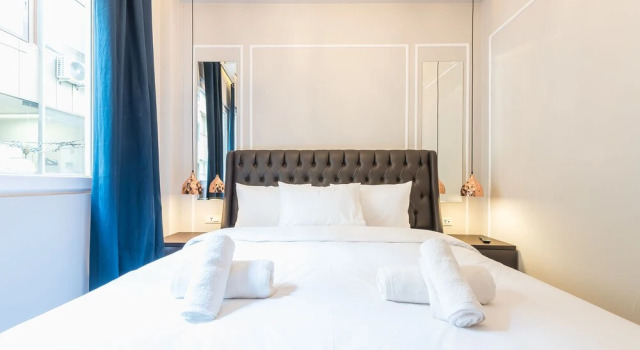 Апартаменты Superior Garment District Suites