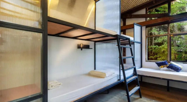 Кровать в общем номере Eia by Dawata Boutique Stay, Yoga & Cafe