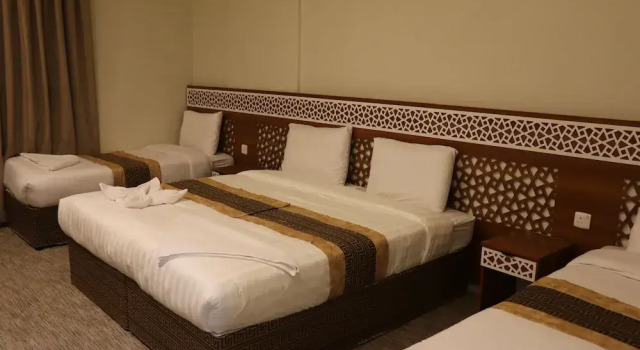 Четырёхместный номер Luxury فندق كنوز العنود مكة للغرف والأجنحة الفندقية - Knoz Al Anood Hotel Makkah for Hotel Rooms and Suites