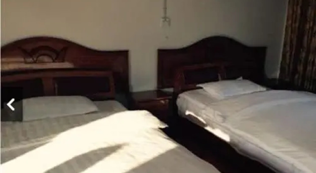 Huiweilou Guest House, Book Pension Hoteller i Enshi med parkering, Parkering