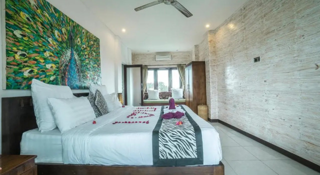 Двухместный номер Deluxe с балконом и с красивым видом из окна Iman Homestay Ubud
