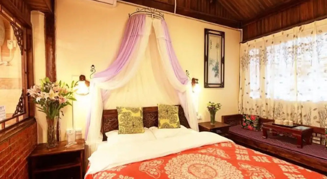 Номер Deluxe Lijiang shuimuxiquan Inn