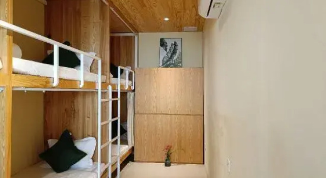 Кровать в общем номере Vả Riverside Retreat