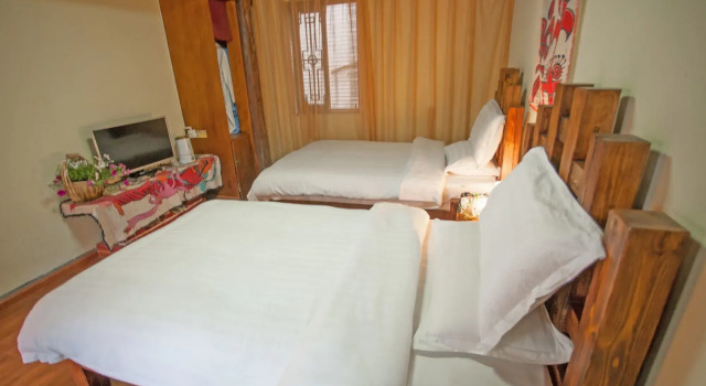 Qingman Sunshine Inn, Забронировать Отель Отели Лицзян 3 звезды, рядом с Улица Сквер-стрит Древнего города Даянь, 3*