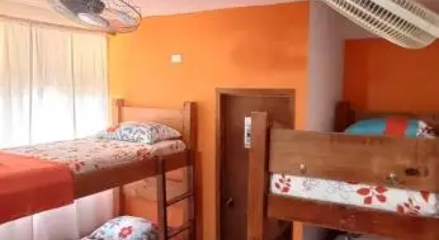 Кровать в общем номере Casa Italia Guest House