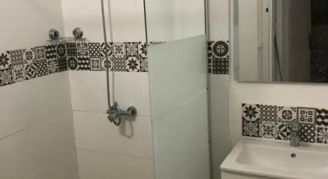 Кровать в общем номере La Promenade House