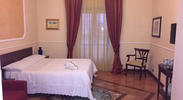 Четырёхместный семейный номер Standard с балконом и с видом на город B&B Lumasa