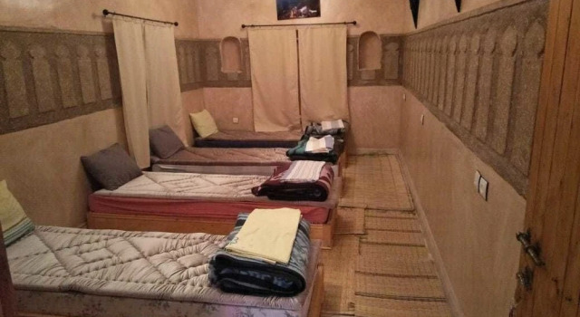 Кровать в общем номере Gite Paradis d'Ait Bouguemez - Hostel