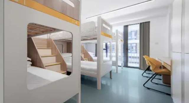 Кровать в общем номере с балконом Taoyi Chaosheng Apartment (Taoxichuan Cultural and Creative Block)