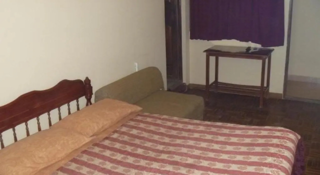 Кровать в общем номере Julia Plaza Hotel