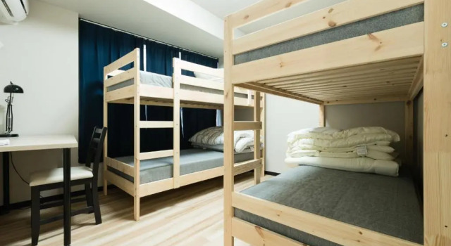 Кровать в общем номере Tokyo Guest House Ouji Music Lounge