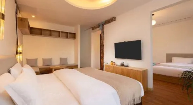 Люкс Дуплекс с 3 комнатами Jiuling shanJu Hotel, Xinduqiao, Kangding City
