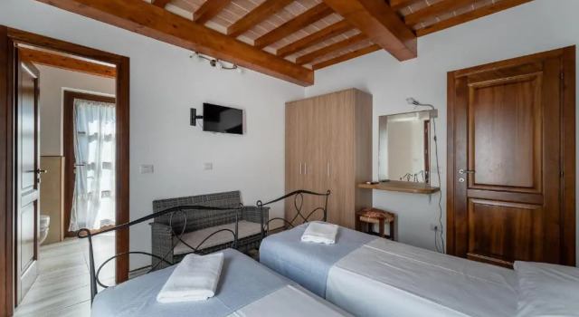 Standard Vierer Zimmer mit Gartenblick Hotel Delfino