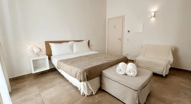 Четырёхместный номер Deluxe с балконом San Michele Rooms & Private SPA