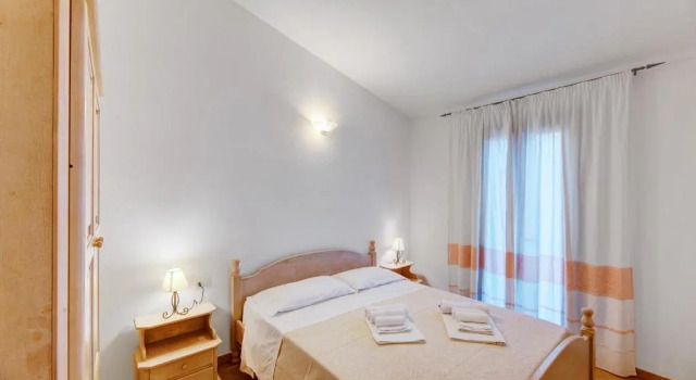 Апартаменты с 2 комнатами Appartamenti Badus con piscina