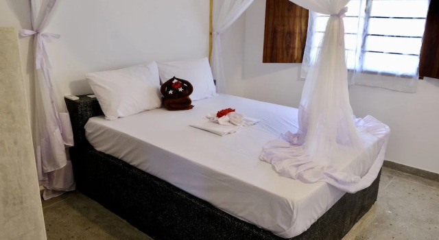 Семейные апартаменты с 2 комнатами с балконом и с видом на бассейн Nyumbani Residence Suites
