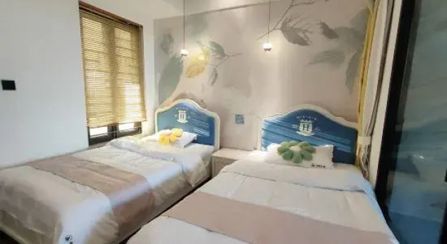 Семейный люкс с 2 комнатами с видом на море Starfish Apartment (Shantou Zhonghai Gold Coast Branch)