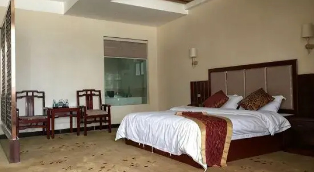 Люкс Deluxe Ruili Xingyi Business Hotel