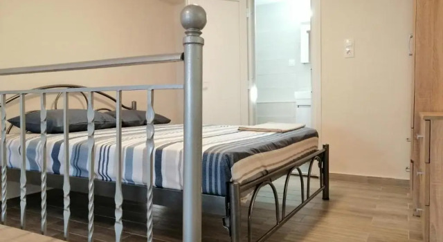 Marina's Apartments - White & Stone Apartment