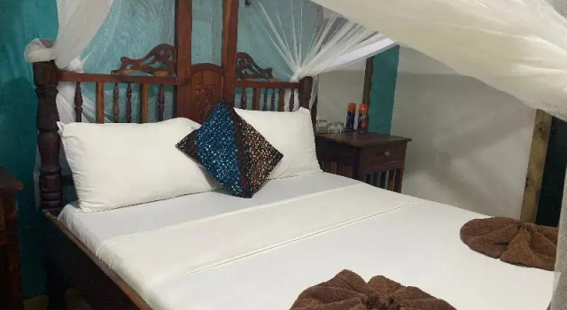 Двухместный номер Standard с балконом и с видом на сад Mbuyuni Beach Village - Bungalows