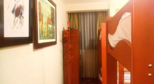 Кровать в общем номере Lima Backpackers