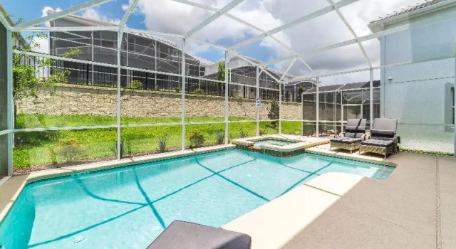 Кровать в общем номере с 6 комнатами ChampionsGate Resort Homes and Townhomes
