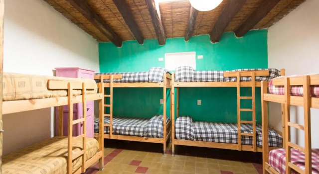 Кровать в общем номере Viracocha Art Hostel Cachi