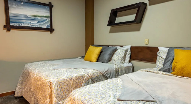 Четырёхместный номер Deluxe с балконом и рядом с пляжем Ast Surf Hotel