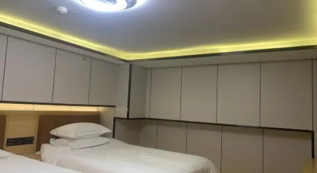 Кровать в общем номере Super 8 Collection Hotel (Beijing Xizhimen People's Hospital)