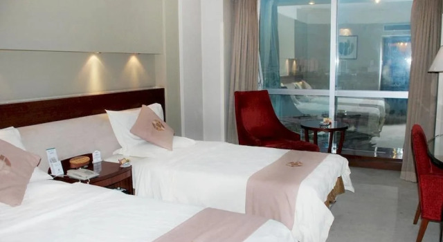 Dezhou World Hotel, Забронировать Отель Дежоу Шаньдун