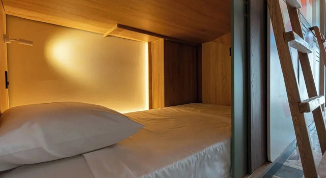 Кровать в общем номере Casa Stella Rooms