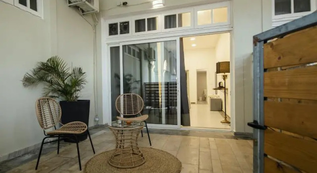 Семейный номер Standard с балконом и с видом на сад Olive Grove Beachfront Apartments & Suites