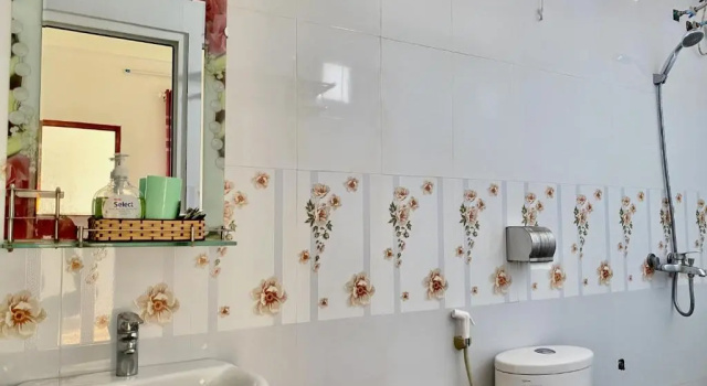 Кровать в общем номере Tien's Cozy Homestay