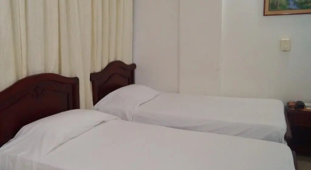 Четырёхместный номер Economy Hotel Comercial