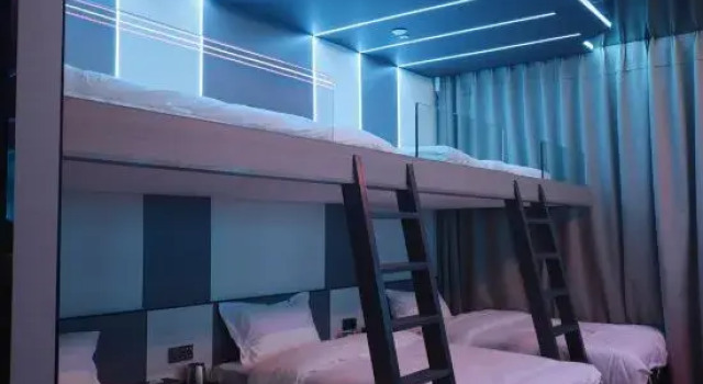 Кровать в общем номере Manyun V+ E-Sports Hotel (Ruiyang Avenue)