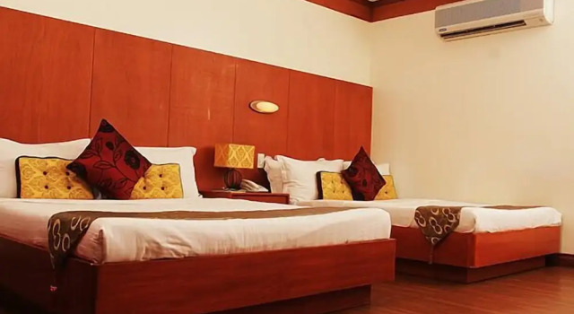 Четырёхместный номер Deluxe Nagaland Hotel