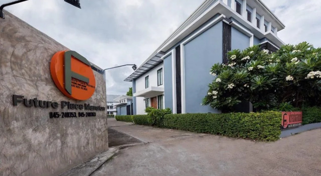 Кровать в общем номере Future Place Mansion Ubon