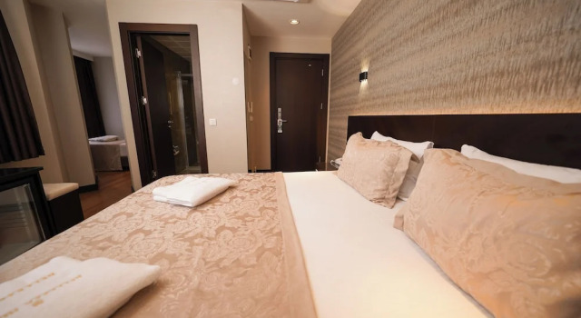 Трёхместный номер Deluxe Bellezza Hotel