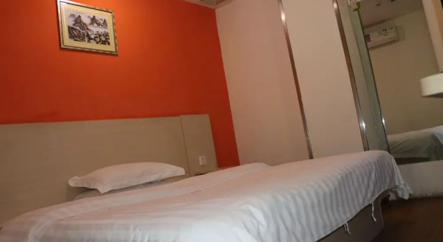 Номер Comfort Yixin Business Hotel