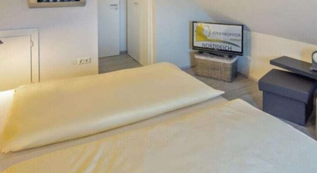 Коттедж с балконом Holiday Apartment Nordperle 6