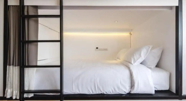 Кровать в общем номере The Common Hostel