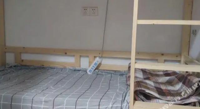 Кровать в общем номере Ganzhou Qixi International Youth Hostel