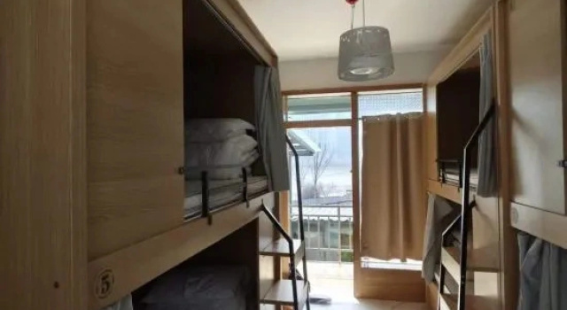 Кровать в общем номере (женский номер) Ming Youji Hostel