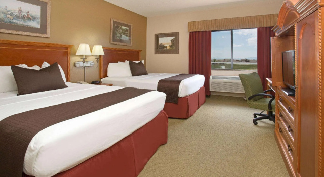 Четырёхместный номер Standard AmericInn by Wyndham Laramie Near University of Wyoming