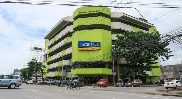 Кровать в общем номере Sugbutel Family Hotel Cebu powered by Cocotel