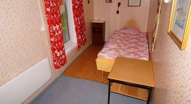 Кровать в общем номере Innante Gamle Våningshus Cabin – Torvikbukt