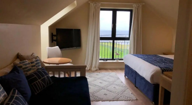 Двухместный номер Deluxe с видом на море Teach Cruachan Large-Group Holiday Home