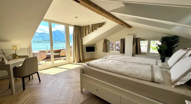 Люкс Boutique Hotel & Restaurant Niesenblick - Lakefront rooms with balcony on Lake Thun - SELF CHECK IN & digitale Reception