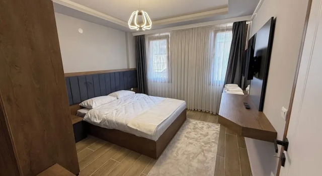 Апартаменты Deluxe с балконом и с частичным видом на море Güven Palace Suites