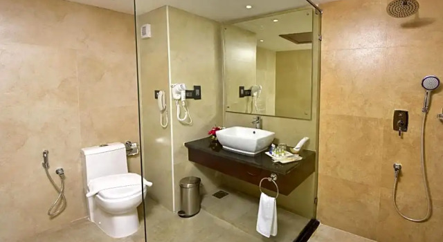 Номер Executive Classic Sarovar Portico Trivandrum